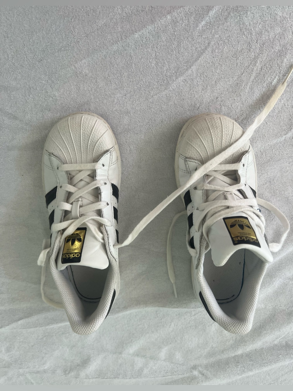 adidas Kids White Sneakers with Black Stripes and Gold Logo